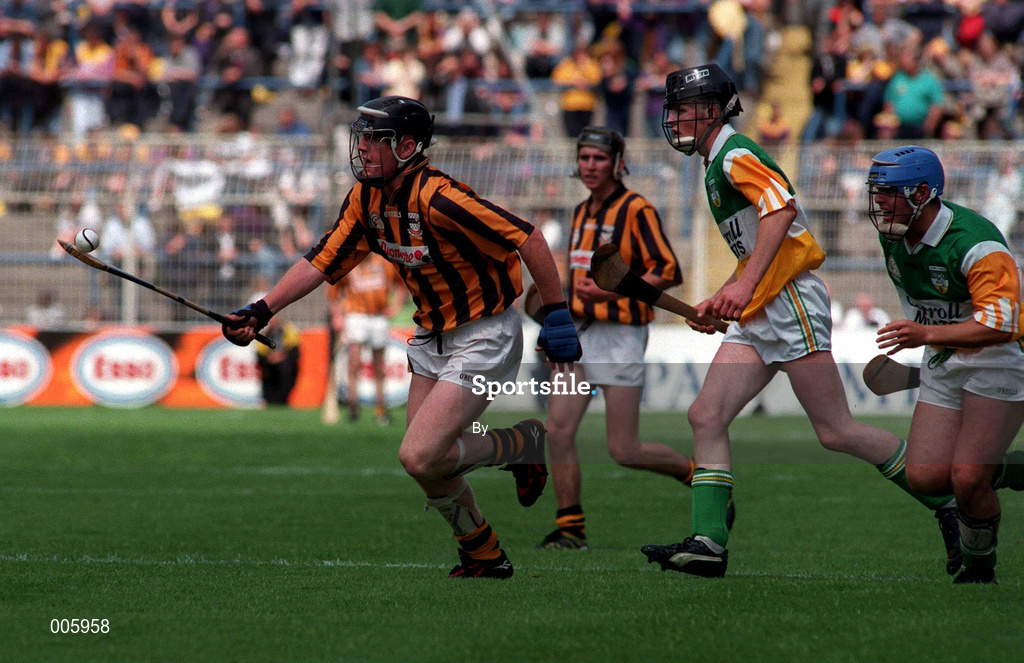 13 July 1997. Kilkenny's Kevin Power gets away from Offaly pair Willie Comerford and Jimmy Doyle. Leinster Minor Hurling Final, Kilkenny v Offaly, Croke Park. Picture Credit: Brendan Moran/SPORTSFILE.