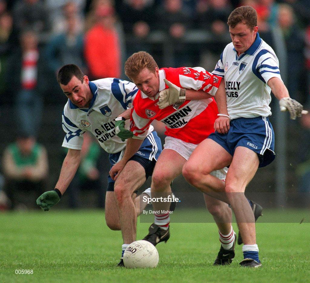 31 May 1998; Kieran McKeever of Derry in action against Peter Duffy, left, and Cyril Ronaghan of Monaghan during the Ulster GAA Football Senior Championship Quarter-Final match between Derry and Monaghan at Celtic Park in Derry. Photo by David Maher/Sportsfile