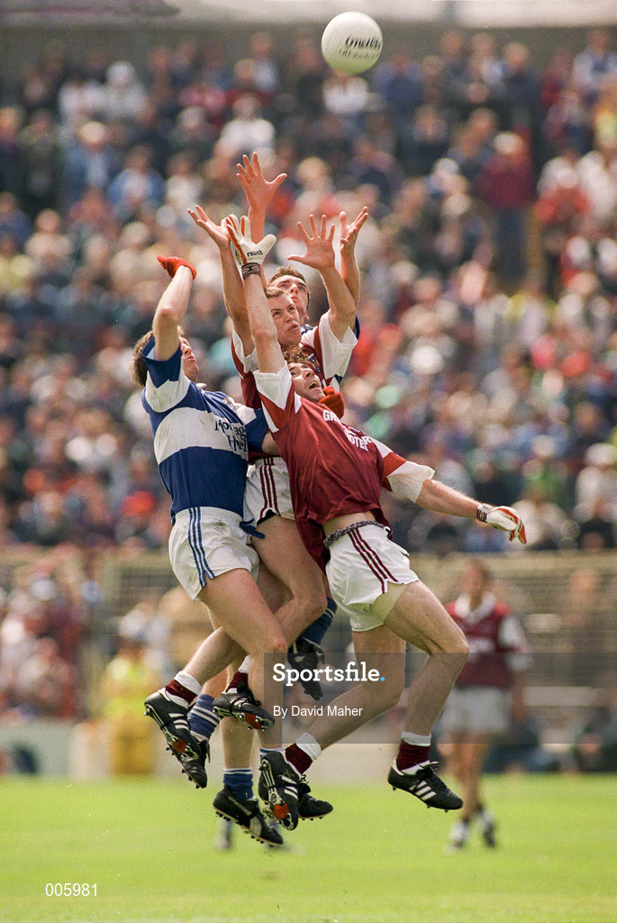 7 June 1998; David Hughes, 17, and Damien Gavin of Westmeath in action against Tony Maher and Noel Garvan of Laois during the Leinster Senior Football Championship Quarter-Final match between Laois and Westmeath at Croke Park in Dublin. Photo by David Maher/Sportsfile