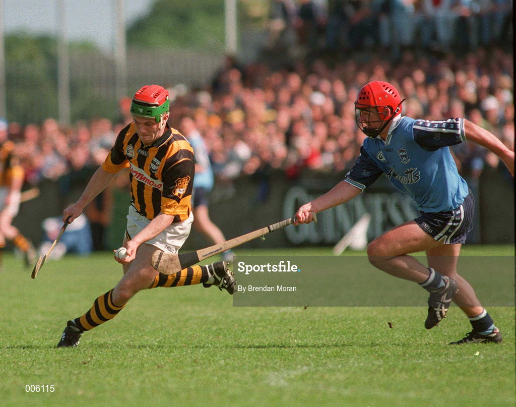 31 May 1998; Niall Moloney of Kilkenny gets away from Sean Power of Dublin during the Leinster GAA Hurling Senior Championship Quarter-Final match between Dublin and Kilkenny at Parnell Park in Dublin. Photo by Brendan Moran/Sportsfile
