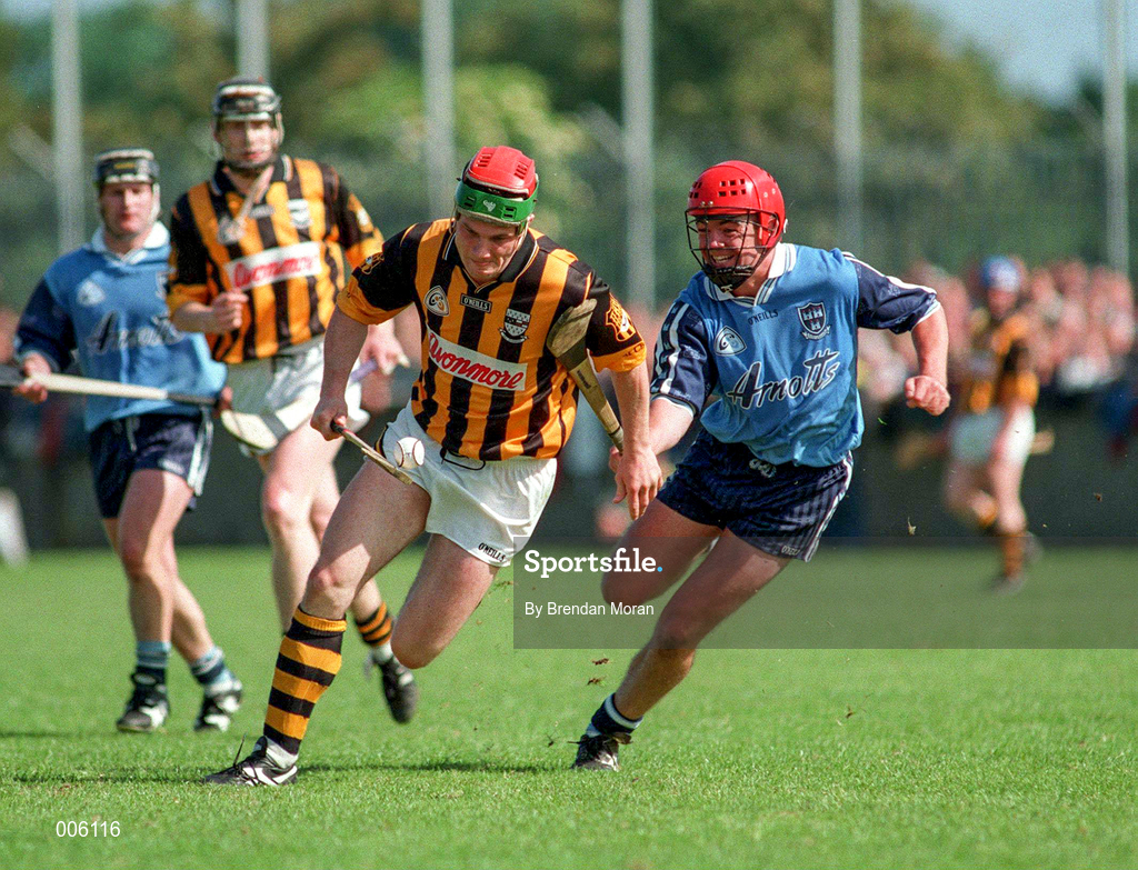 31 May 1998; Niall Moloney of Kilkenny gets away from Sean Power of Dublin during the Leinster GAA Hurling Senior Championship Quarter-Final match between Dublin and Kilkenny at Parnell Park in Dublin. Photo by Brendan Moran/Sportsfile