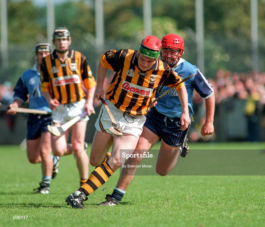 31 May 1998; Niall Moloney of Kilkenny gets away from Sean Power of Dublin during the Leinster GAA Hurling Senior Championship Quarter-Final match between Dublin and Kilkenny at Parnell Park in Dublin. Photo by Brendan Moran/Sportsfile