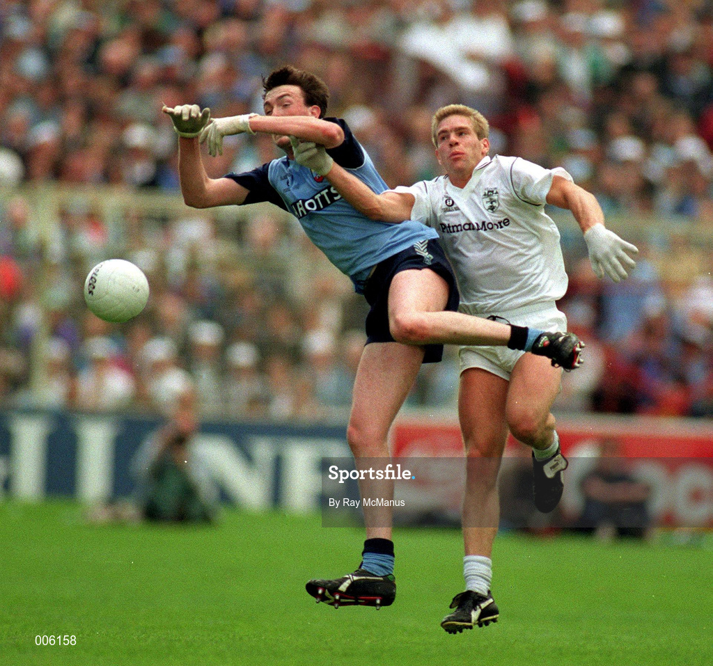 25 July 1993; Pat Gilroy of Dublin in a tussle for possession with Denis O'Connell of Kildare during the Leinster Football Final match between Dublin and Kildare at Croke Park, Dublin. Photo by Ray McManus/Sportsfile
