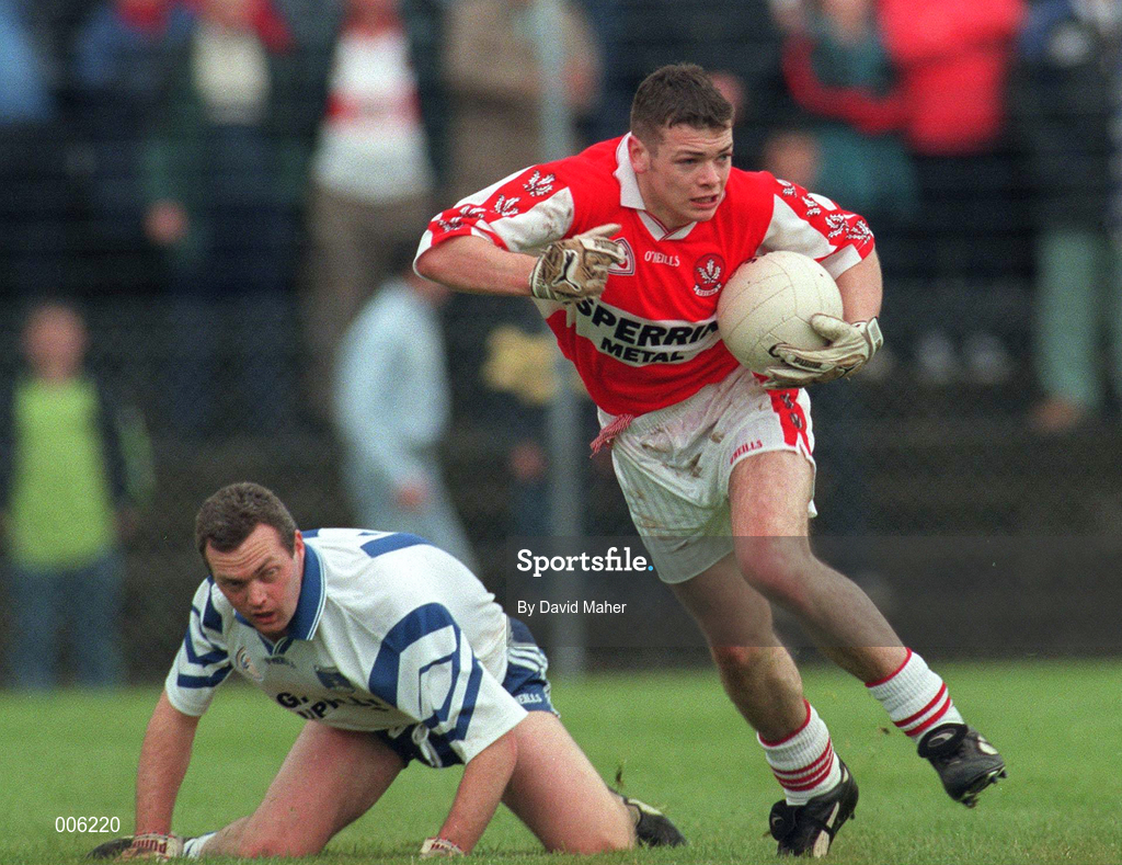 31 May 1998; Paul McFlynn of Derry in action against Kevin Hughes of Monaghan during the Ulster GAA Football Senior Championship Quarter-Final match between Derry and Monaghan at Celtic Park in Derry. Photo by David Maher/Sportsfile