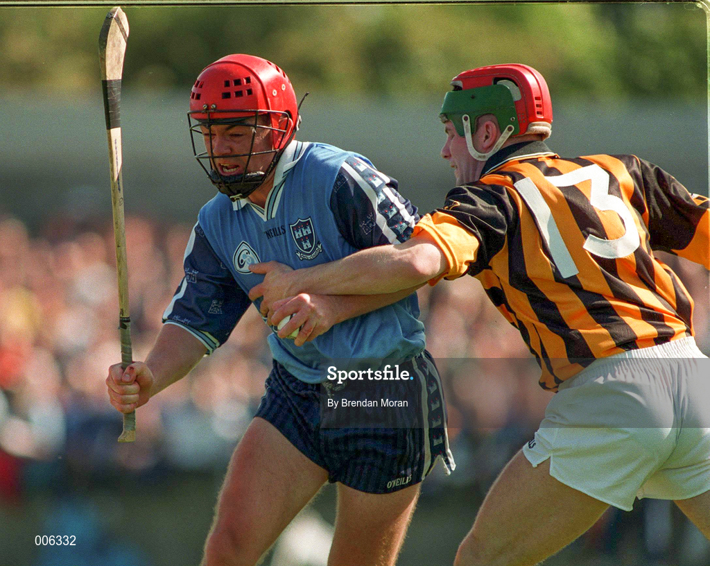 31 May 1998; Sean Power of Dublin gets past the challenge of Niall Moloney of Kilkenny during the Leinster GAA Hurling Senior Championship Quarter-Final match between Dublin and Kilkenny at Parnell Park in Dublin. Photo by Brendan Moran/Sportsfile