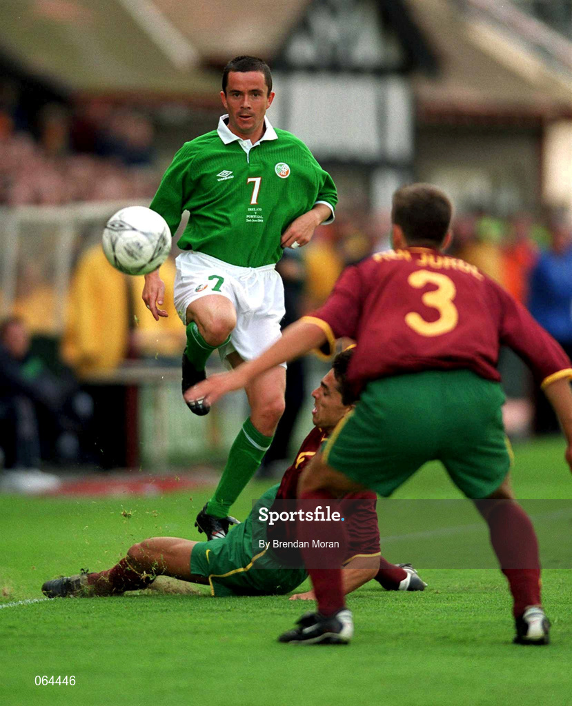2 June 2001; Gary Kelly of Republic of Ireland is tackled by Roberto 'Beto' Severo of Portugal during the FIFA World Cup 2002 Group 2 Qualifier match between Republic of Ireland and Portugal at Lansdowne Road in Dublin. Photo by Brendan Moran/Sportsfile