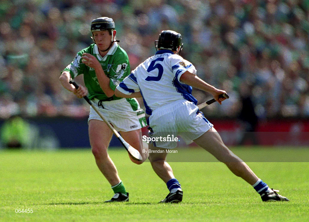 10 June 2001; James Butler of Limerick in action against James Murray of Waterford during the Guinness Munster Senior Hurling Championship Semi-Final match between Limerick and Waterford at Páirc Uí Chaoimh in Cork. Photo by Brendan Moran/Sportsfile