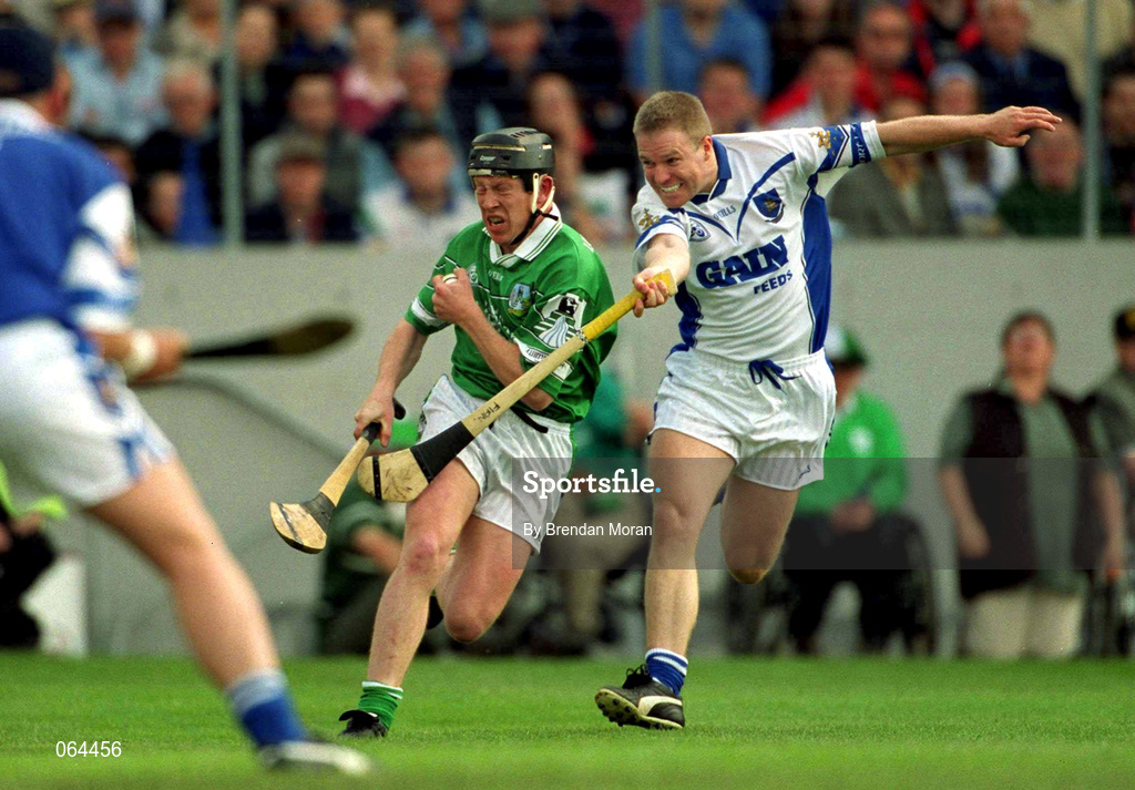 10 June 2001; James Butler of Limerick in action against Brian Flannery of Waterford during the Guinness Munster Senior Hurling Championship Semi-Final match between Limerick and Waterford at Páirc Uí Chaoimh in Cork. Photo by Brendan Moran/Sportsfile