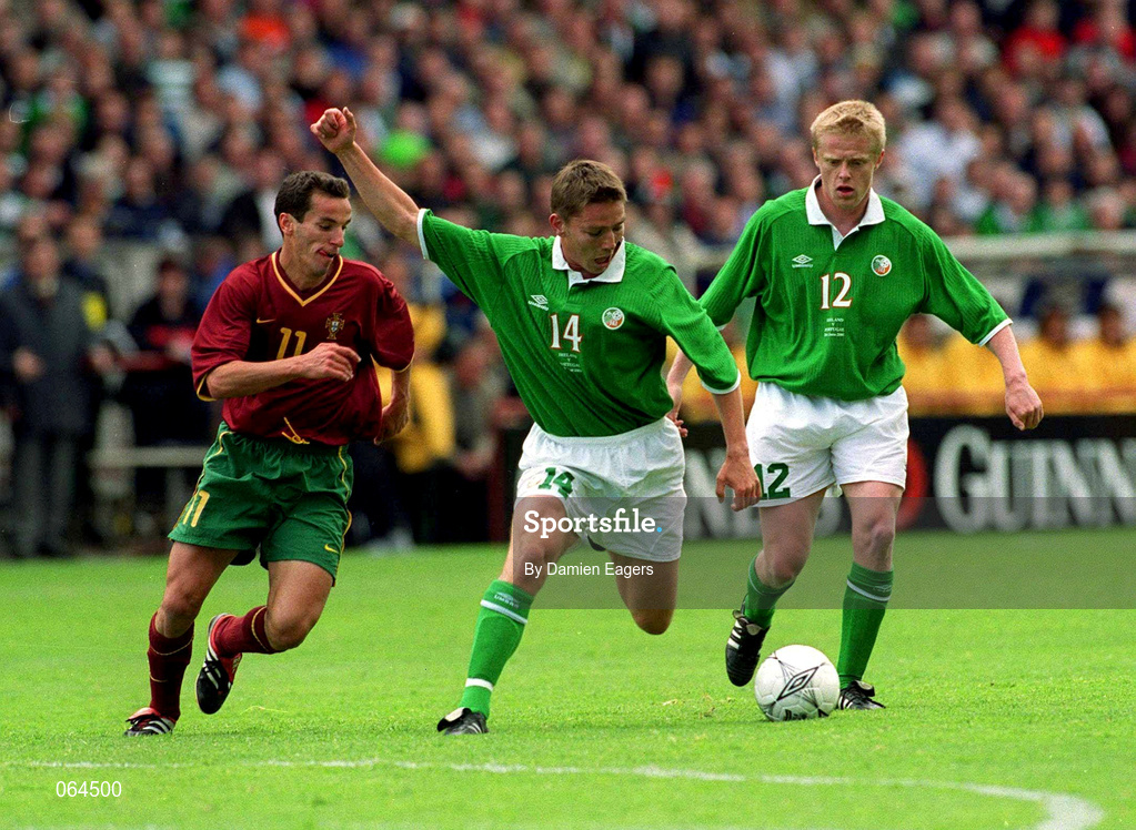 2 June 2001; Matt Holland of Republic of Ireland in action against Armando Petit of Portugal during the FIFA World Cup 2002 Group 2 Qualifier match between Republic of Ireland and Portugal at Lansdowne Road in Dublin. Photo by Damien Eagers/Sportsfile
