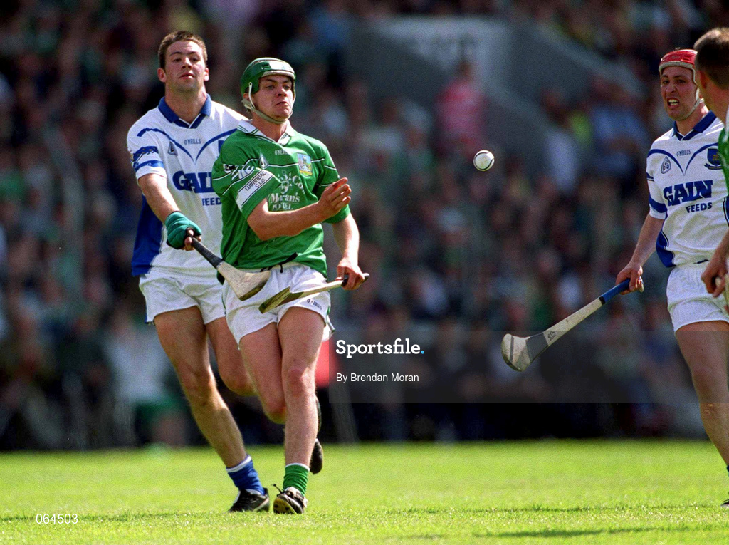 10 June 2001; Mike O'Brien of Limerick in action against Dan Shanahan of Waterford during the Guinness Munster Senior Hurling Championship Semi-Final match between Limerick and Waterford at Páirc Uí Chaoimh in Cork. Photo by Brendan Moran/Sportsfile