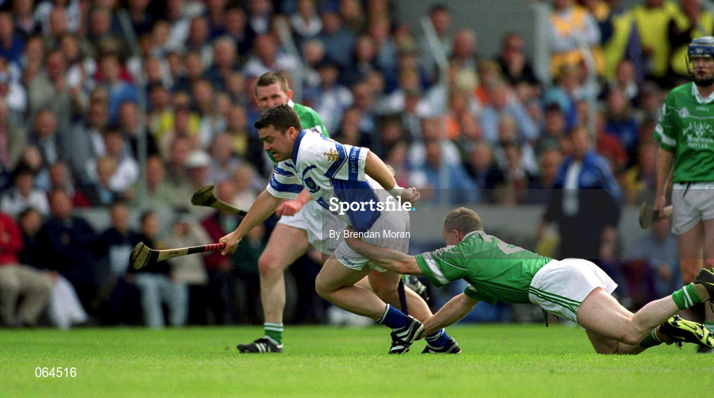 10 June 2001; Paul Flynn of Waterford in action against Stephen McDonagh of Limerick during the Guinness Munster Senior Hurling Championship Semi-Final match between Limerick and Waterford at Páirc Uí Chaoimh in Cork. Photo by Brendan Moran/Sportsfile