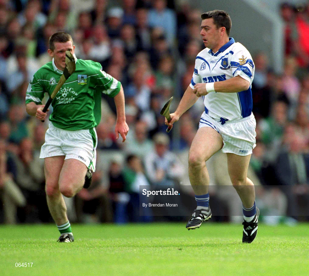 10 June 2001; Paul Flynn of Waterford in action against Mark Foley of Limerick during the Guinness Munster Senior Hurling Championship Semi-Final match between Limerick and Waterford at Páirc Uí Chaoimh in Cork. Photo by Brendan Moran/Sportsfile