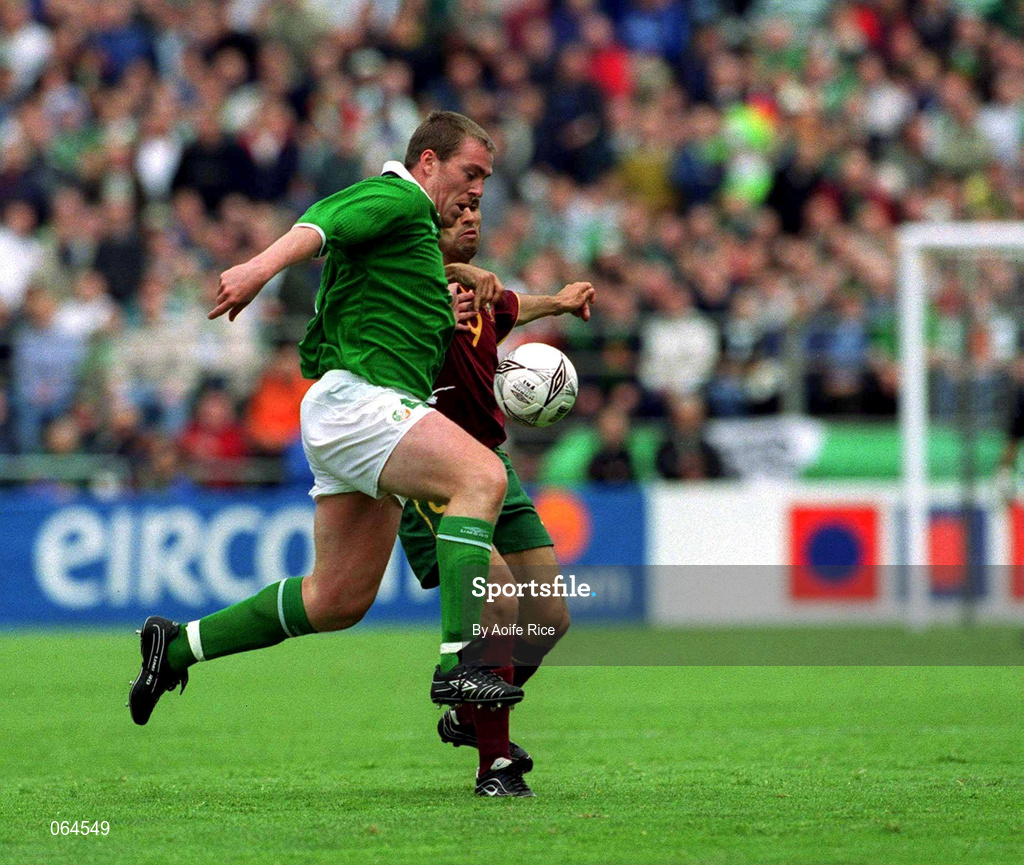 2 June 2001; Richard Dunne of Republic of Ireland in action against Pedro Pauletta of Portugal during the FIFA World Cup 2002 Group 2 Qualifier match between Republic of Ireland and Portugal at Lansdowne Road in Dublin. Photo by Aoife Rice/Sportsfile