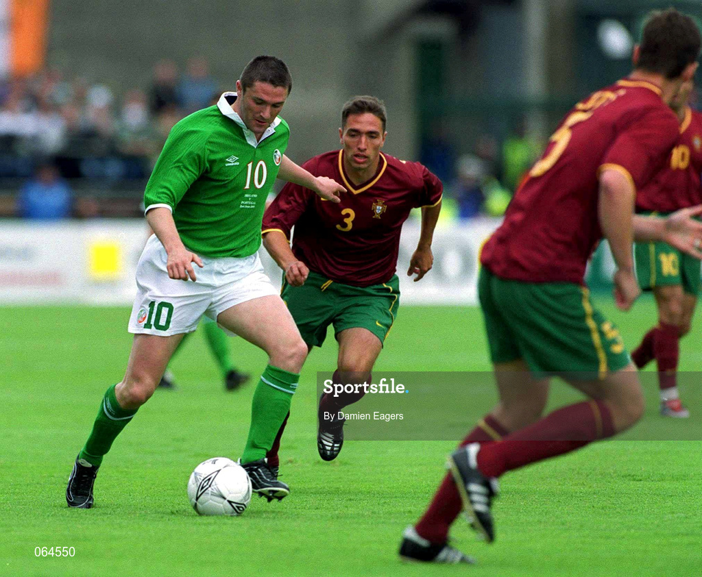 2 June 2001; Robbie Keane of Republic of Ireland in action against Rui Jorge of Portugal during the FIFA World Cup 2002 Group 2 Qualifier match between Republic of Ireland and Portugal at Lansdowne Road in Dublin. Photo by Damien Eagers/Sportsfile