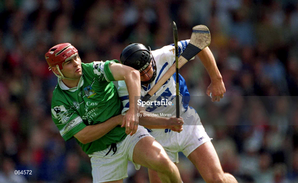 10 June 2001; Seamus Prendergast of Waterford in action against TJ Ryan of Limerick during the Guinness Munster Senior Hurling Championship Semi-Final match between Limerick and Waterford at Páirc Uí Chaoimh in Cork. Photo by Brendan Moran/Sportsfile