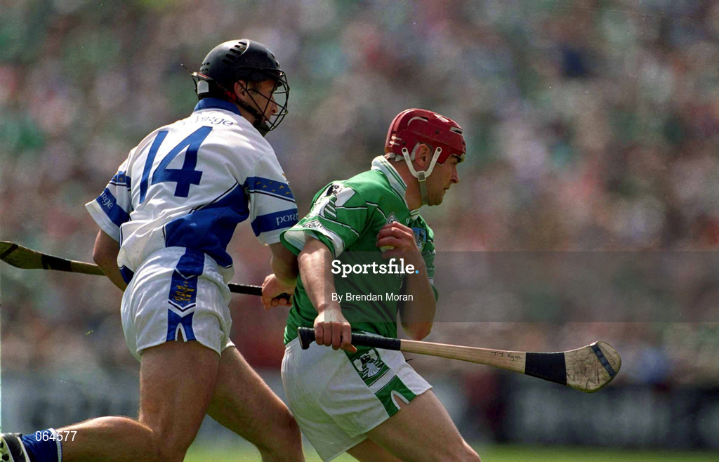 10 June 2001; TJ Ryan of Limerick in action against Seamus Prendergast of Waterford during the Guinness Munster Senior Hurling Championship Semi-Final match between Limerick and Waterford at Páirc Uí Chaoimh in Cork. Photo by Brendan Moran/Sportsfile