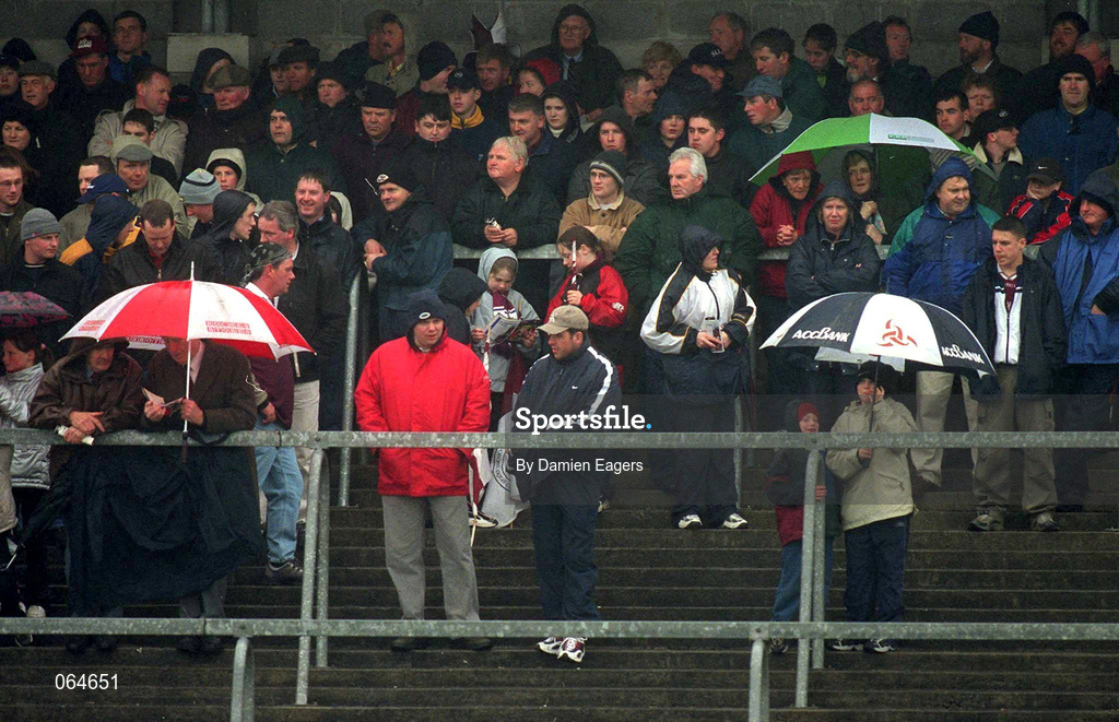 21 April 2001; Supporters seek shelter from the weather conditions during the Allianz GAA National Football League Division 1 Semi-Final match between Galway and Sligo in Dr Hyde Park in Roscommon. Photo by Damien Eagers/Sportsfile