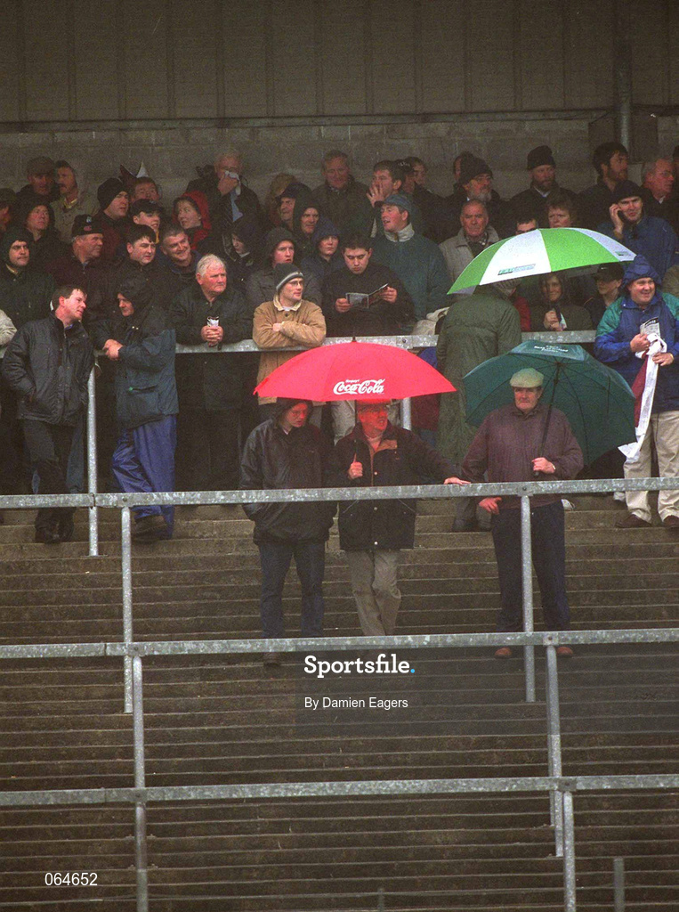 21 April 2001; Supporters seek shelter from the weather conditions during the Allianz GAA National Football League Division 1 Semi-Final match between Galway and Sligo in Dr Hyde Park in Roscommon. Photo by Damien Eagers/Sportsfile