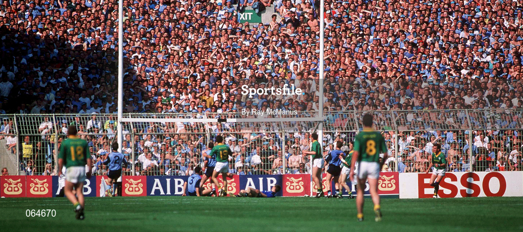 6 July 1991; Kevin Foley of Meath shoots to score a goal late in the game as Dublin supporters on Hill 16 look on during the Leinster Senior Football Championship Preliminary Round Third Replay match between Dublin and Meath at Croke Park in Dublin. Photo by Ray McManus/Sportsfile