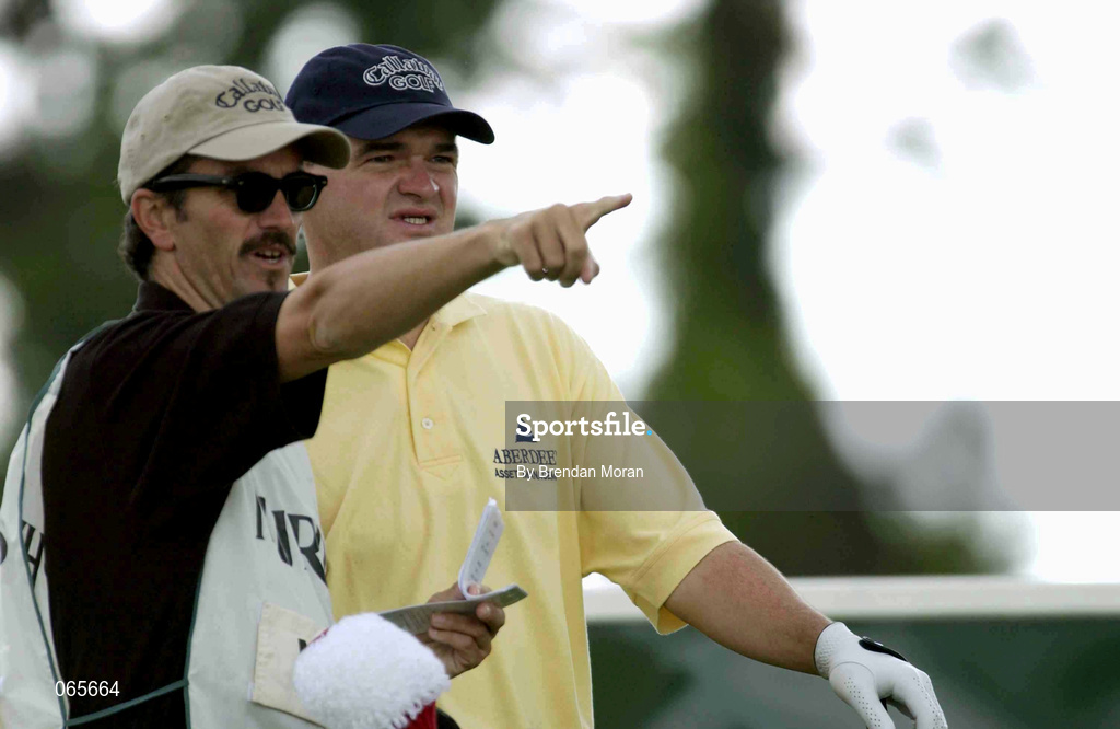 27 June 2001; Paul Lawrie of Scotland checks the yardage with the help from caddy Colin Byrne,  during the Pro Am ahead of the Murphy's Irish Open Golf Championship at Fota Island Golf Club in Fota Island, Cork. Photo by Brendan Moran/Sportsfile