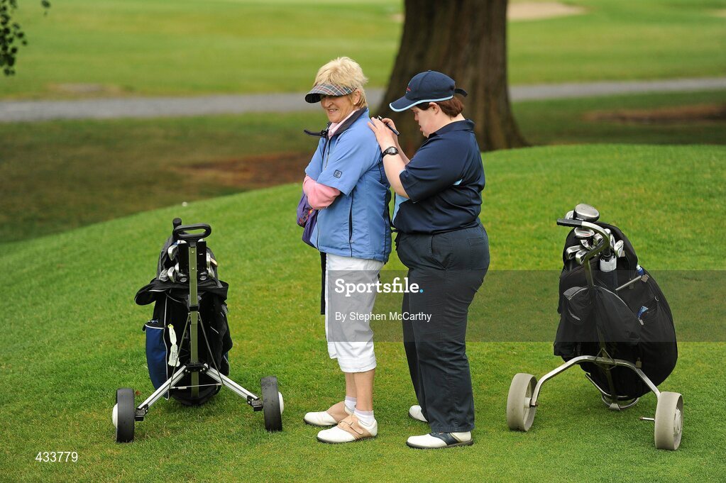 12 June 2010; Claire Savage, from Rathcoole, Dublin, examines her scorecard with the help of her caddy Dympna Cotter, Celbridge, Co. Kildare, following the Golf competition during the third day of the 2010 Special Olympics Ireland Games. Limerick Golf Club, Limerick. Picture credit: Stephen McCarthy / SPORTSFILE