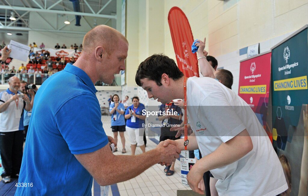 12 June 2010; Munster and Ireland rugby player Paul O'Connell presents a silver medal to Oryien Hannigan from Cavan after he finished 2nd in the 25m Backstroke. 2010 Special Olympics Ireland Games. University of Limerick, Limerick. Picture credit: Diarmuid Greene / SPORTSFILE