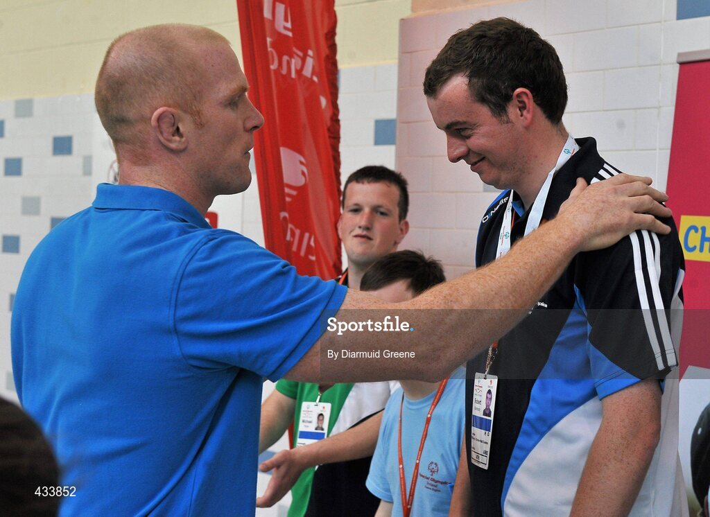 12 June 2010; Munster and Ireland rugby player Paul O'Connell congratulates Robert Kennedy from Oldcastle, Co. Meath after presenting him with a bronze medal after he finished 3rd in the 25m Backstroke during the 2010 Special Olympics Ireland Games. University of Limerick, Limerick. Picture credit: Diarmuid Greene / SPORTSFILE