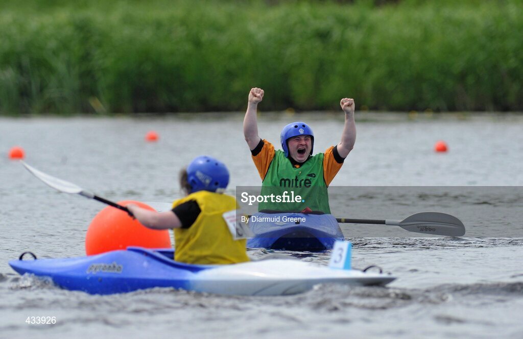 12 June 2010; Shaun Bradley, from Letterkenny, Co. Donegal, celebrates after winning the 200m Round Final, Division 3, as Deirdre O'Callaghan, from Finglas, Dublin, crosses the line to finish in 3rd place during the 2010 Special Olympics Ireland Games. University of Limerick Rowing Club, Limerick. Picture credit: Diarmuid Greene / SPORTSFILE