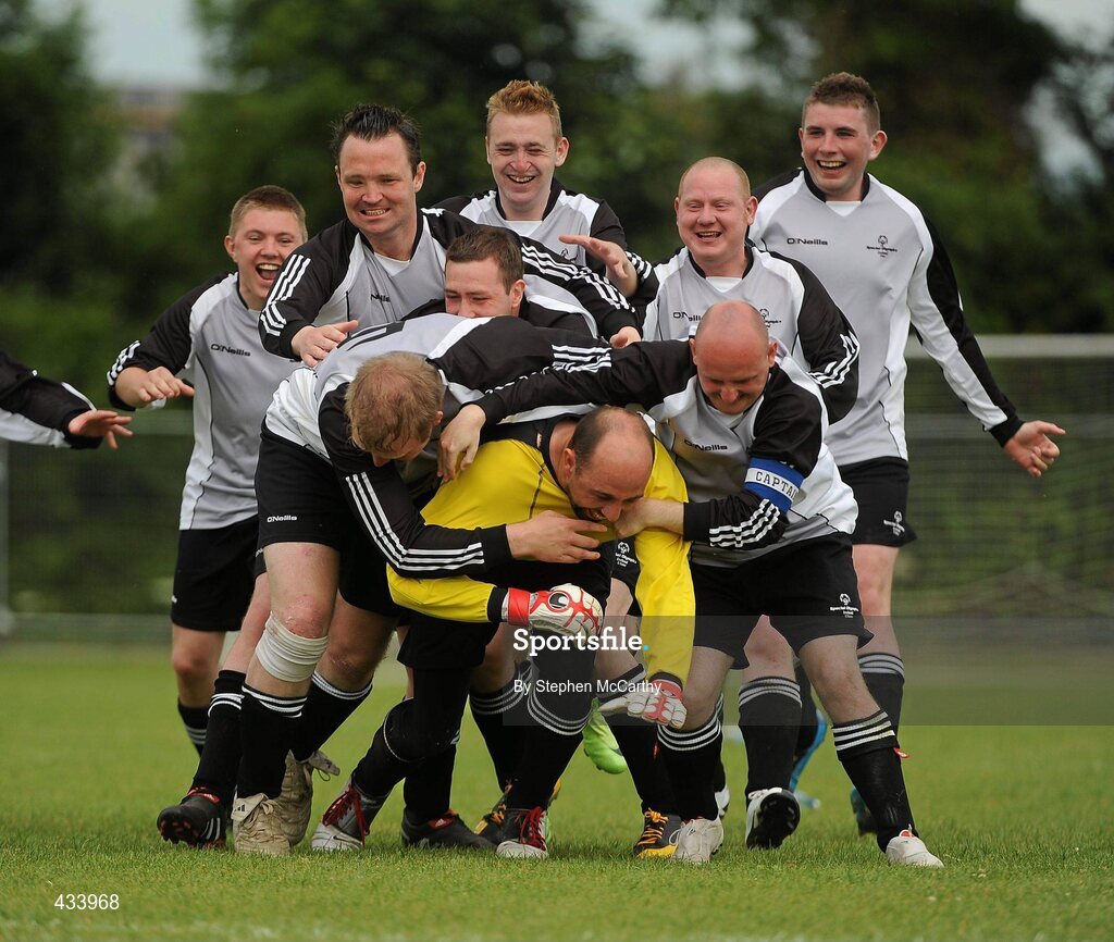 12 June 2010; Goalkeeper Ollie Boyle, from Letterkenny, Co. Donegal, is congratulted by his Ulster Region team-mates after a penalty shoot-out victory over Munster Region in the 11-a-side football event during the third day of the 2010 Special Olympics Ireland Games. University of Limerick, Limerick. Picture credit: Stephen McCarthy / SPORTSFILE