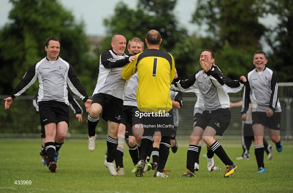 12 June 2010; Goalkeeper Ollie Boyle, from Letterkenny, Co. Donegal, is congratulted by his Ulster Region team-mates after a penalty shoot-out victory over Munster Region in the 11-a-side football event during the third day of the 2010 Special Olympics Ireland Games. University of Limerick, Limerick. Picture credit: Stephen McCarthy / SPORTSFILE