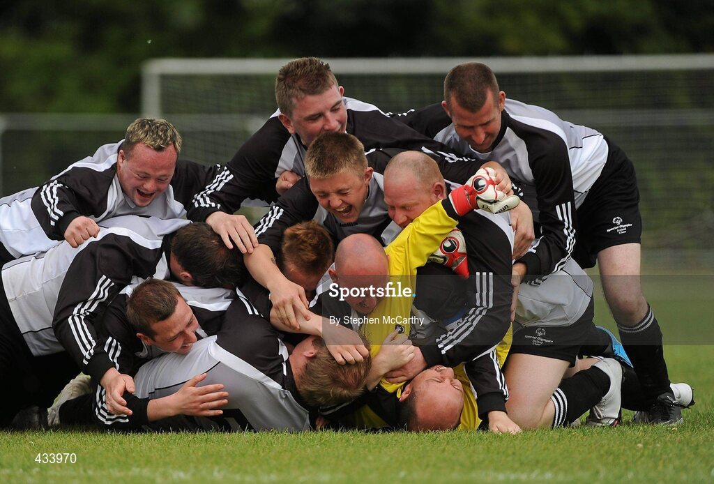 12 June 2010; Goalkeeper Ollie Boyle, from Letterkenny, Co. Donegal, is congratulted by his Ulster Region team-mates after a penalty shoot-out victory over Munster Region in the 11-a-side football event during the third day of the 2010 Special Olympics Ireland Games. University of Limerick, Limerick. Picture credit: Stephen McCarthy / SPORTSFILE