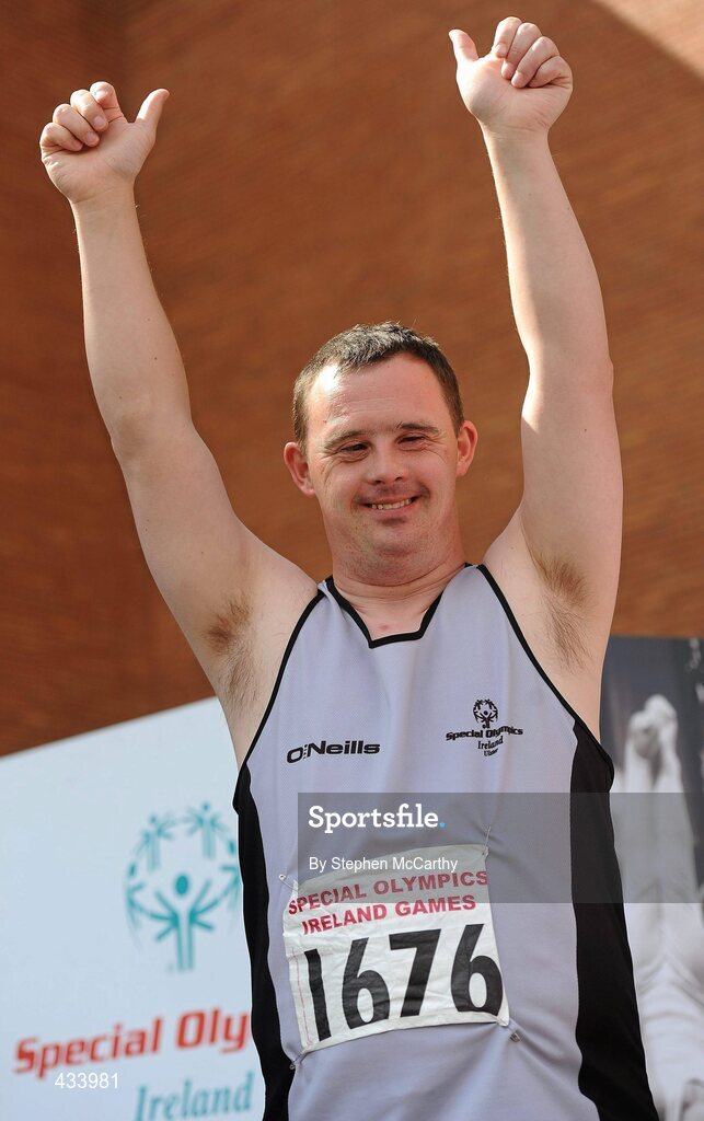 12 June 2010; Martin Mulhood, Cavan, celebrates after being presented with a gold medal in the 4 kilo shotputt event during the third day of the 2010 Special Olympics Ireland Games. University of Limerick, Limerick. Picture credit: Stephen McCarthy / SPORTSFILE