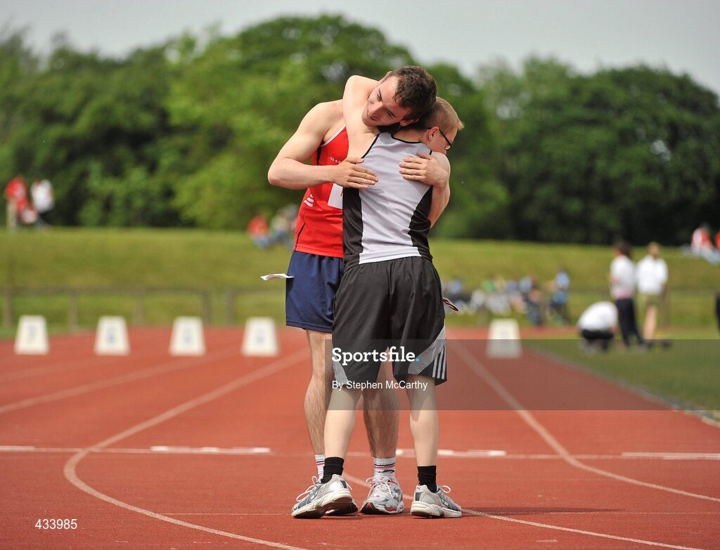 12 June 2010; Fergal Crowley, from Fermoy, Cork, left, embraces Michael Egan, from Athlone, Westmeath, following their 50m run event during the third day of the 2010 Special Olympics Ireland Games. University of Limerick, Limerick. Picture credit: Stephen McCarthy / SPORTSFILE