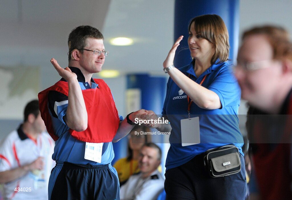 12 June 2010; Simon Darragh, from Celbridge, Co. Kildare, celebrates with assistant Ann O'Gorman after winning a game during the Bocce at 2010 Special Olympics Ireland Games. Limerick Racecourse, Patrickswell, Co. Limerick. Picture credit: Diarmuid Greene / SPORTSFILE