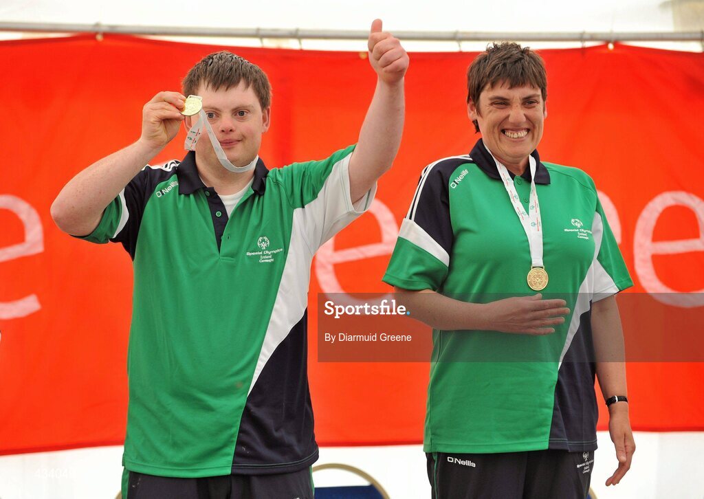 12 June 2010; Paul Cannon, from Galway, left, and Jane Maher, from Tuam, Co. Galway celebrate after receiving their gold medals in the Division 4 Bocce Doubles Finals at 2010 Special Olympics Ireland Games. Limerick Racecourse, Patrickswell, Co. Limerick. Picture credit: Diarmuid Greene / SPORTSFILE