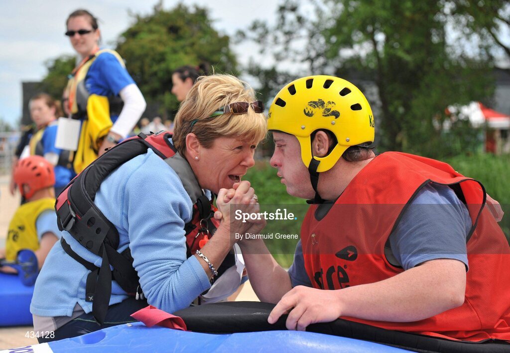 12 June 2010; Athlete Kevin Smyth, from Co. Down, with coach Deborah Hempkin before competing in the 200m Round Final, Division 4 Final, during the 2010 Special Olympics Ireland Games. University of Limerick Rowing Club, Limerick. Picture credit: Diarmuid Greene / SPORTSFILE