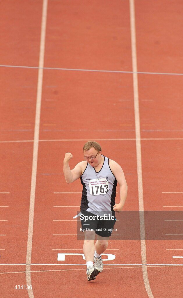 12 June 2010; Martin Myles, from Breffni, Cavan, celebrates as he crosses the finish line after the 400m Run, division 127, at the 2010 Special Olympics Ireland Games. University of Limerick, Limerick. Picture credit: Diarmuid Greene / SPORTSFILE