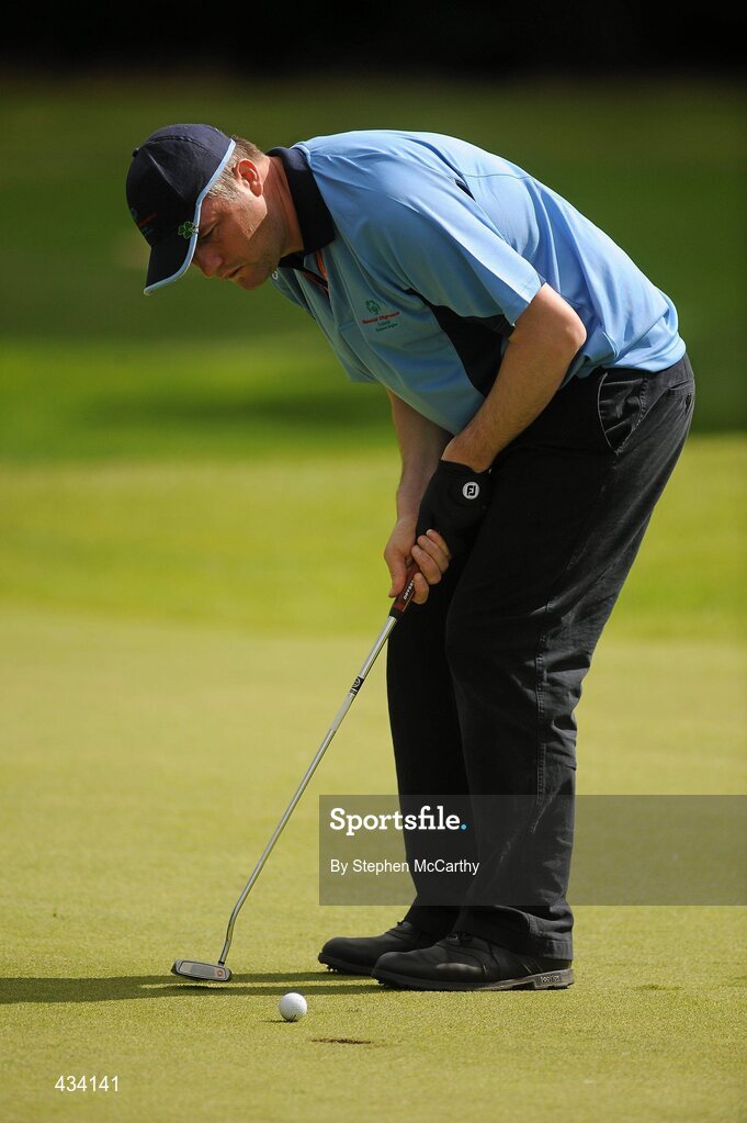 12 June 2010; Thomas Griffin, from Stillorgan, Dublin, Eastern Region, putts on the 18th green during the 18 hole Golf event during the third day of the 2010 Special Olympics Ireland Games. Limerick Golf Club, Limerick. Picture credit: Stephen McCarthy / SPORTSFILE