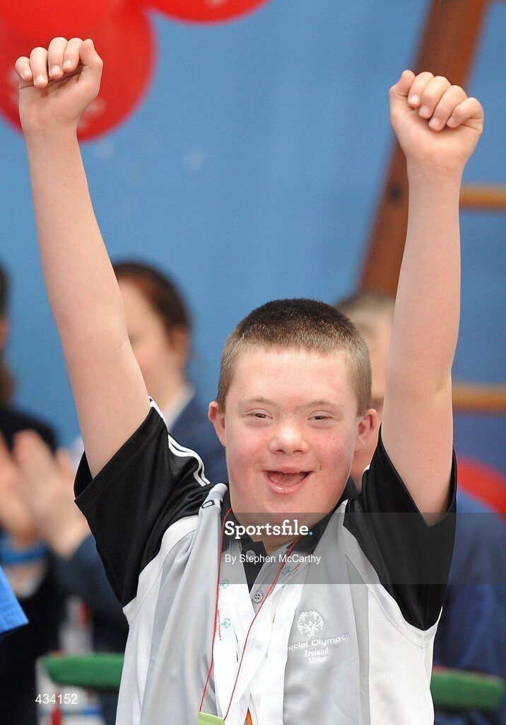 12 June 2010; Ryan Craig, from Belfast, Antrim, Ulster Region, on his way to picking up his gold medal at the Gymnastics presentation during the third day of the 2010 Special Olympics Ireland Games. University of Limerick, Limerick. Picture credit: Stephen McCarthy / SPORTSFILE