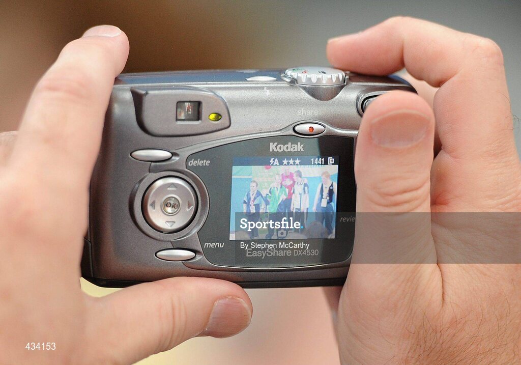 12 June 2010; A spectator takes a picture during the Gymnastics medal presentation during the third day of the 2010 Special Olympics Ireland Games. University of Limerick, Limerick. Picture credit: Stephen McCarthy / SPORTSFILE