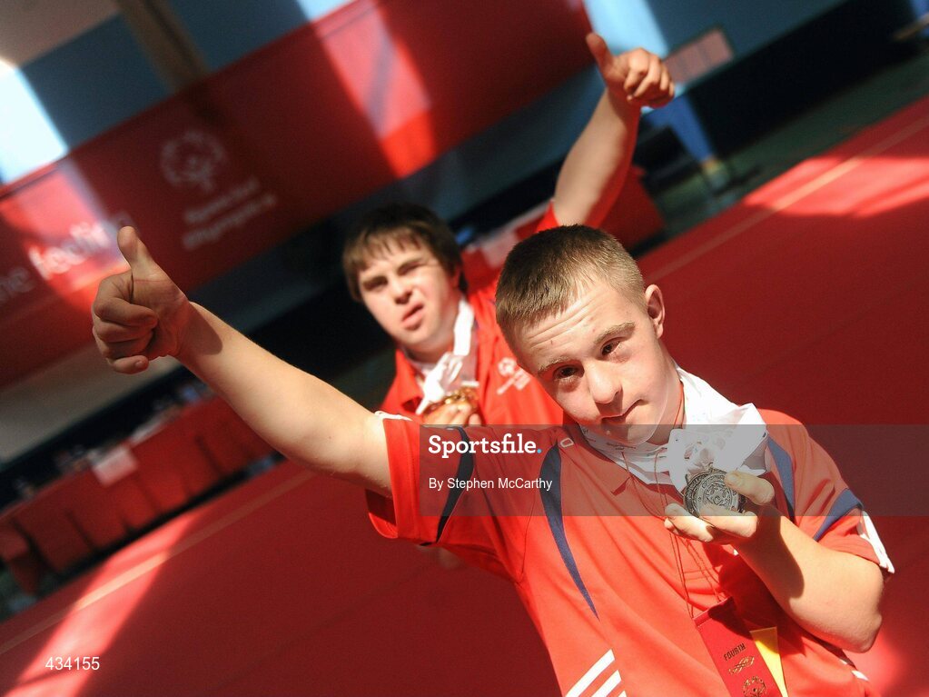 12 June 2010; Munster Region athletes Alan Quinlan, from Cappamore, Limerick, and Eoin Hanly, from Tipperary, show off their medal haul following the Gymnastics medal presentation during the third day of the 2010 Special Olympics Ireland Games. University of Limerick, Limerick. Picture credit: Stephen McCarthy / SPORTSFILE