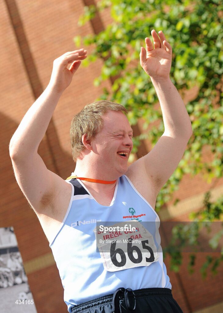 12 June 2010; Patrick O'Shea, from Swords, Dublin, Eastern Region, celebrates ahead of receiving his bronze medal for 4 Kilo Shotputt during the third day of the 2010 Special Olympics Ireland Games. University of Limerick, Limerick. Picture credit: Stephen McCarthy / SPORTSFILE