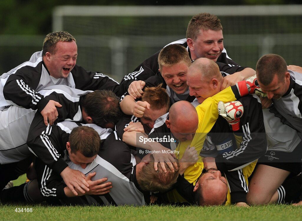 12 June 2010; Goalkeeper Ollie Boyle, from Letterkenny, Co. Donegal, is congratulated by his Ulster Region team-mates after a penalty shoot-out victory over Munster Region in the 11-a-side football event during the third day of the 2010 Special Olympics Ireland Games. University of Limerick, Limerick. Picture credit: Stephen McCarthy / SPORTSFILE