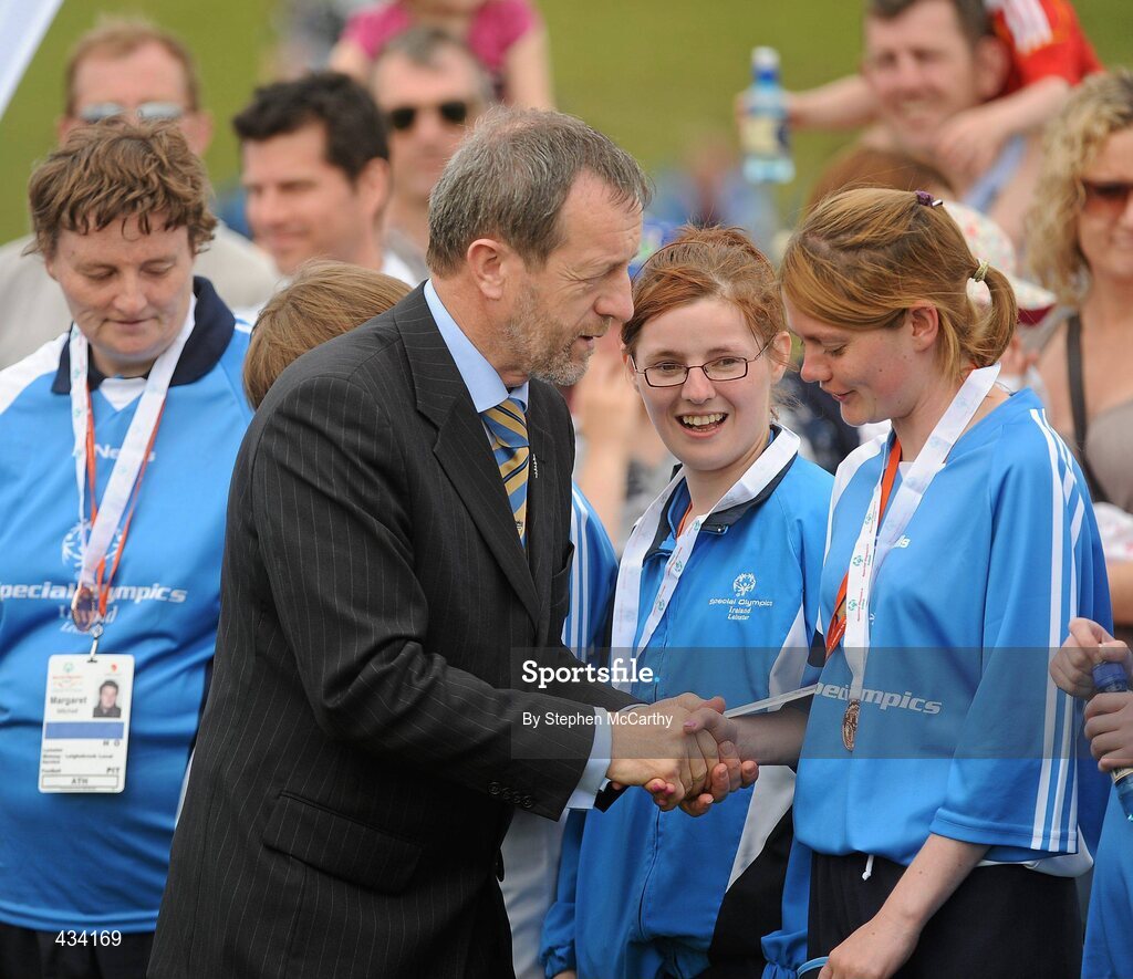 12 June 2010; Former GAA President Sean Kelly, MEP, presents Regina Rattigan, Leinster Region, with her silver medal for women's 5-a-side football during the third day of the 2010 Special Olympics Ireland Games. University of Limerick, Limerick. Picture credit: Stephen McCarthy / SPORTSFILE