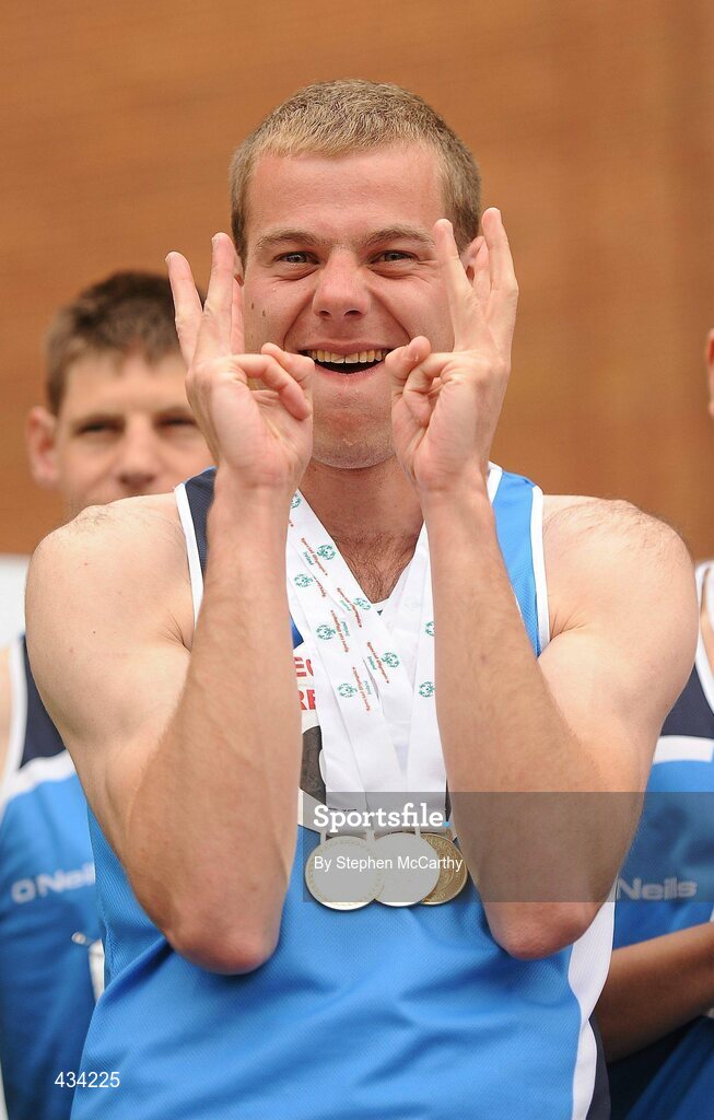 13 June 2010; Edward Kennedy, from Drogheda, Louth, celebrates after picking up his third athletics medal during the final day of the 2010 Special Olympics Ireland Games. University of Limerick, Limerick. Picture credit: Stephen McCarthy / SPORTSFILE