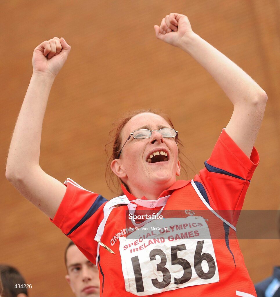 13 June 2010; Christine Minogue, from Limerick, Munster Region, celebrates after picking up her athletics relay medal during the final day of the 2010 Special Olympics Ireland Games. University of Limerick, Limerick. Picture credit: Stephen McCarthy / SPORTSFILE