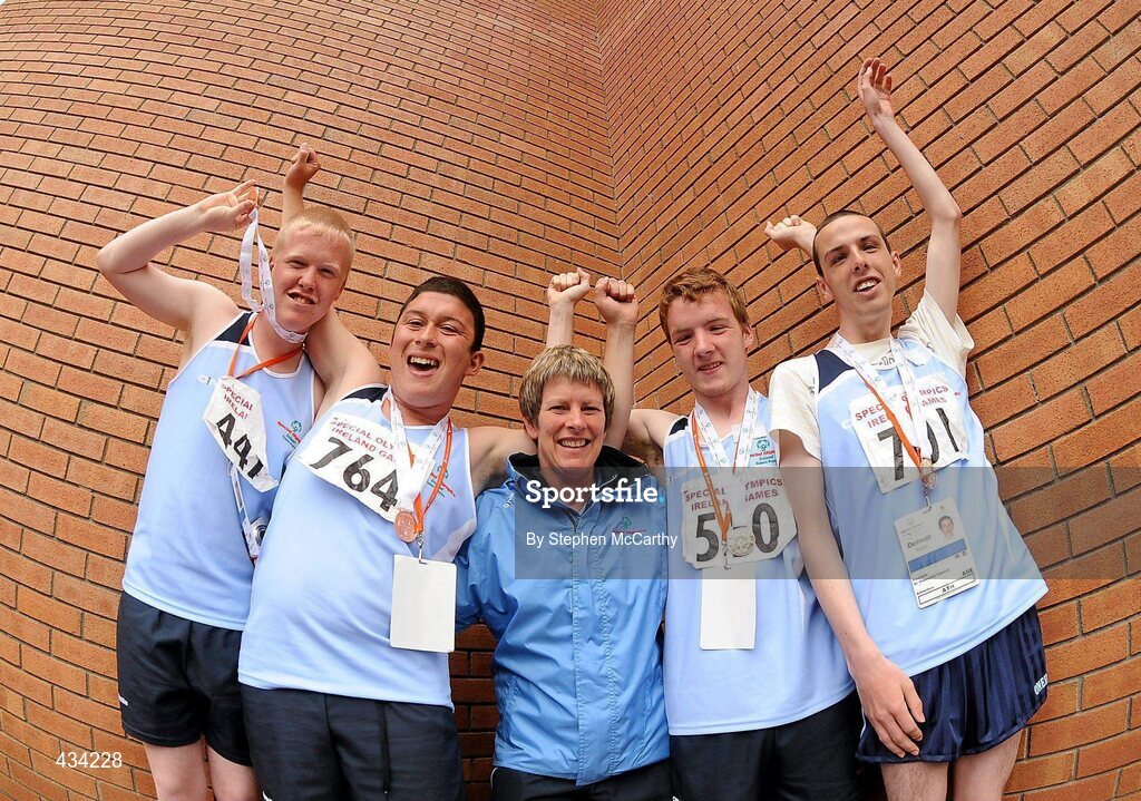 13 June 2010; Members of the Eastern Region relay team, from left, Dan Haddock, from North King Street, Dublin, Aaron Zuikouski, from Cabra, Dublin, coach Maura Grace, from Drumcondra, Dublin, Darragh Losty, Cabra, Dublin and Dermot Ryan, Clonsilla, Dublin, celebrate after collecting their bronze medal during the final day of the 2010 Special Olympics Ireland Games. University of Limerick, Limerick. Picture credit: Stephen McCarthy / SPORTSFILE