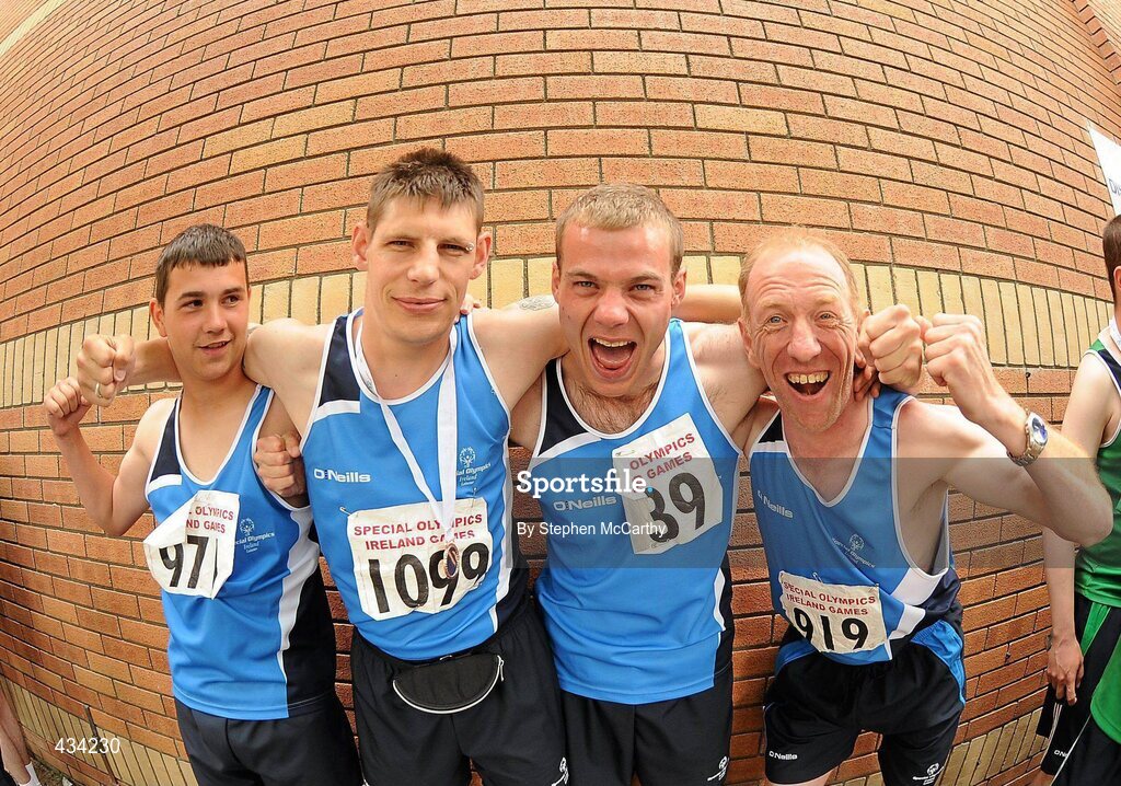 13 June 2010; Eastern Region relay athletes, from left, Ben Marron, from Dundalk, Louth, Keith Kelly, Drogheda, Louth, Edward Kennedy, Drogheda, Louth, and Philip Hughes, Enniscorthy, Wexford, celebrate on their way to collect their medals during the final day of the 2010 Special Olympics Ireland Games. University of Limerick, Limerick. Picture credit: Stephen McCarthy / SPORTSFILE