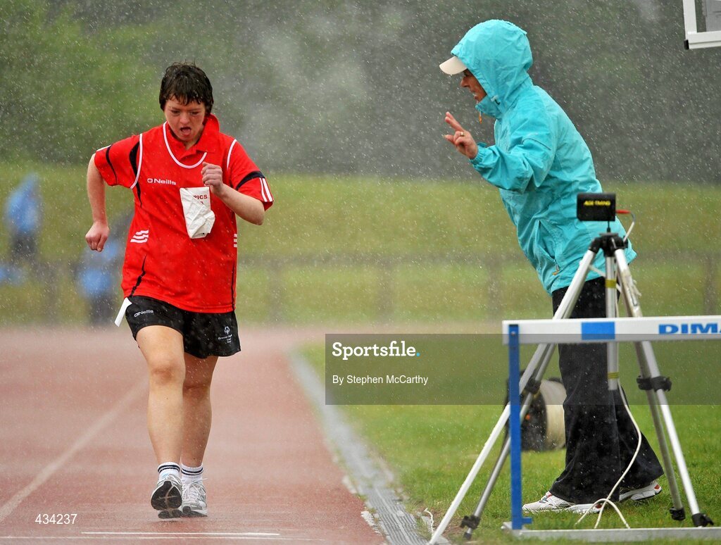 13 June 2010; Elizabeth Walsh, Knocknagree, Kerry, is informed of her position from a judge during the 1500m walk & run athletics event during the final day of the 2010 Special Olympics Ireland Games. University of Limerick, Limerick. Picture credit: Stephen McCarthy / SPORTSFILE