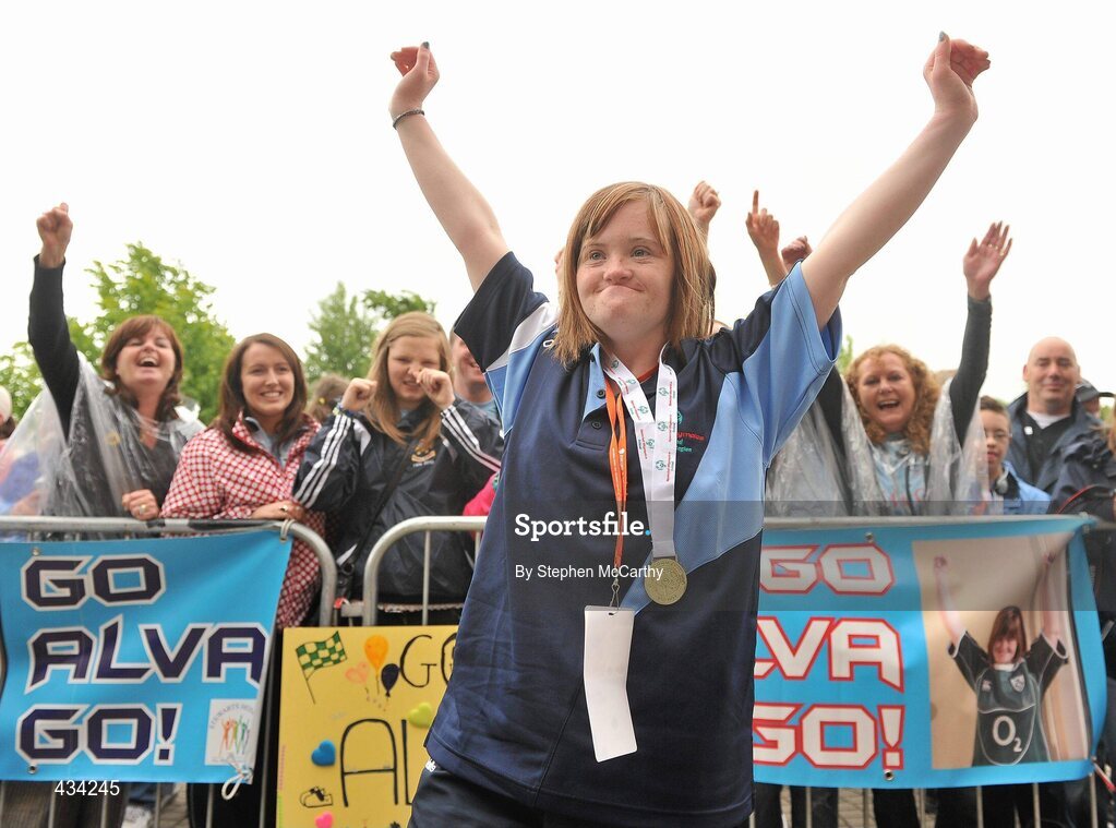 13 June 2010; Alva Kiberd, from Clondalkin, Dublin, celebrates with friends and family after picking up a gold medal with her Eastern Region team during the athletics relay during the final day of the 2010 Special Olympics Ireland Games. University of Limerick, Limerick. Picture credit: Stephen McCarthy / SPORTSFILE